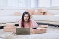 Beautiful Asian woman working and using her laptop Royalty Free Stock Photo