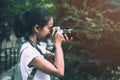Beautiful Asian women with backpack aim camera Royalty Free Stock Photo