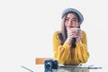 Beautiful Asian women drink coffee at home with refreshing face