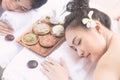 Beautiful asian woman lying with happy mood on vacation day.Wellness body care and spa aromatheraphy concept