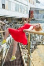 Beautiful asian women posing on excavator background