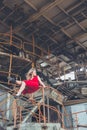 Beautiful asian women posing on excavator background