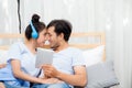 Beautiful asian young couple listening to music with tablet on bed, Love, dating Royalty Free Stock Photo