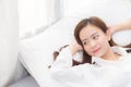 Beautiful asian young woman sleeping lying in bed with head on pillow comfortable and happy. Royalty Free Stock Photo