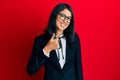 Beautiful asian young woman wearing business suit doing happy thumbs up gesture with hand Royalty Free Stock Photo