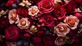beautiful assortment of roses in shades of red and pink, with touches of gold and textured berries