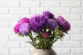 Beautiful aster flower bouquet in vase