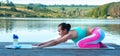 Beautiful athletic girl doing yoga against the backdrop of beautiful nature, pose asana Balasana. The concept of a healthy Royalty Free Stock Photo