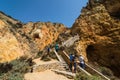 Beautiful atlantic ocean view horizon with sandy beach rocks with stairs on beach on Atlantic ocean in Portugal