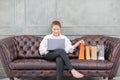 Beautiful Attractive Asian woman using computer laptop for shopping online transform to online payment Royalty Free Stock Photo