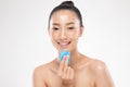 Beautiful Attractive Asian woman using Facial oil clean film to removal oily on face for face fresh skin feeling so fresh and clea Royalty Free Stock Photo