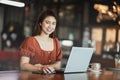 Beautiful Attractive Asian woman working with computer laptop and thinking to get ideas and requirement in Business startup Royalty Free Stock Photo