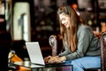 Beautiful Attractive Business Asian woman working with laptop and looking in monitor smile and have positive emotional