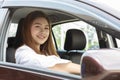 Beautiful attractive young woman smile in casual sitting in car