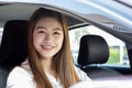 Beautiful attractive young woman smile in casual sitting in car