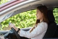 Beautiful attractive young woman smile in casual sitting in car