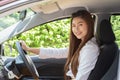 Beautiful attractive young woman smile in casual sitting in car