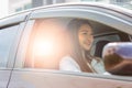 Beautiful attractive young woman smile in casual sitting in car