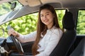 Beautiful attractive young woman smile in casual sitting in car