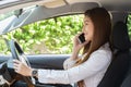 Beautiful attractive young woman smile in casual sitting in car talking in smartphone