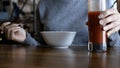 Beautiful attractive young woman to eat a salad diet and tomato juice Royalty Free Stock Photo