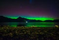Beautiful Aurora Australis and milky way over Lake Wakatipu, Kinloch, New Zealand South Island Royalty Free Stock Photo