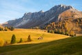 Beautiful autumn colors at the foot of the Odle Mountains  at sunset in the Dolomites, Trentino Alto Adige, Val di Funes Valley, Royalty Free Stock Photo