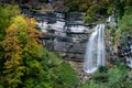 Beautiful fall forest landscape with idyllic waterfall Royalty Free Stock Photo