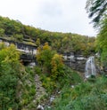 Beautiful fall forest landscape with idyllic waterfall Royalty Free Stock Photo