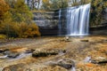 Beautiful fall forest landscape with idyllic waterfall and pool Royalty Free Stock Photo