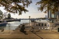 A beautiful autumn landscape along Lake Michigan with boats docked on the blue water, autumn tree, skyscrapers Royalty Free Stock Photo