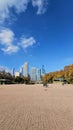 a beautiful autumn landscape at Grant Park with autumn trees and skyscrapers, hotels and office buildings in the city skyline Royalty Free Stock Photo
