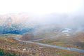 Beautiful autumn landscape in the highlands on a foggy morning Royalty Free Stock Photo