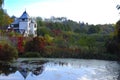 Beautiful autumn landscape with lake and trees. Sunny October day at lake with stunning mirror reflections in water Royalty Free Stock Photo