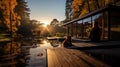 Beautiful autumn landscape with lake, trees and a woman with dog sitting on the deck of cozy terrace wooden country cabin house Royalty Free Stock Photo