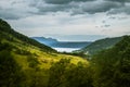 A beautiful autumn landscape of mountains in Folgefonna National park with fjord far in the distance. Fall scenery of southern Nor