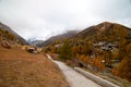 Beautiful autumn landscape with a path towards Zermatt Resort