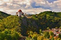 Beautiful autumn landscape with river, castle and blue sky with clouds and sun. Vranov nad Dyji Vranov above Thaya chateau, rive