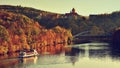 Beautiful autumn landscape with Veveri Castle. Natural colorful scenery with sunset. Brno dam-Czech Republic-Europe.