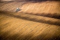 Beautiful autumn landscape with working tractor in south Moravia, Czech Republic. Agriculture concept. Czech TUscany. Moravian wav Royalty Free Stock Photo