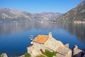 Beautiful autumn Mediterranean landscape. Montenegro. View of Kotor Bay, two small islands  and ancient Church Royalty Free Stock Photo