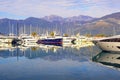 Beautiful autumn Mediterranean landscape. Yacht marina at foot of mountains. Porto Montenegro Marina, Tivat city, Montenegro
