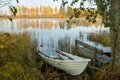 Beautiful autumn morning landscape with old rowing boat and Kymijoki river waters. Finland, Kymenlaakso, Kouvola Royalty Free Stock Photo