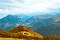 Beautiful autumn mountain landscape, against the blue sky, concept of autumn mountain tourism Royalty Free Stock Photo