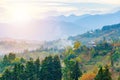 Beautiful autumn mountain landscape. Foggy morning in a hilly village. Georgia, Adjara.