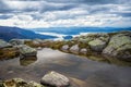 A beautiful autumn mountain landscape with a small lake. Natural scenery in Norwegian mountains. Royalty Free Stock Photo