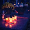 Beautiful autumn night concept. Cemetery and Halloween. Candle in the grave. Background for Halloween. Royalty Free Stock Photo