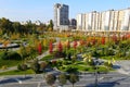 Beautiful autumn park with picturesque yellow orange trees and leaves. Autumn streets in city