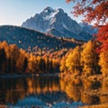 Beautiful autumn scenery. Astonishing morning view of Eibsee lake with Zugspitze mountain range on background. Great