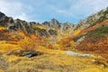 Beautiful autumn scenery of Senjojiki Cirque with rugged peaks in the background